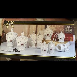 Elegant White Ceramic Canister Set with Floral Accents